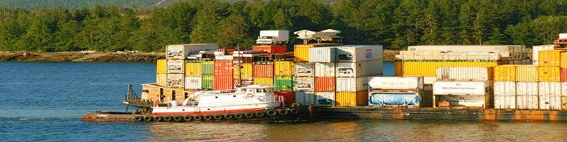 (c) Christine flickr.com/photos/43004363@N00/3819227733/ Alaska tugboat TAURUS moves a barge